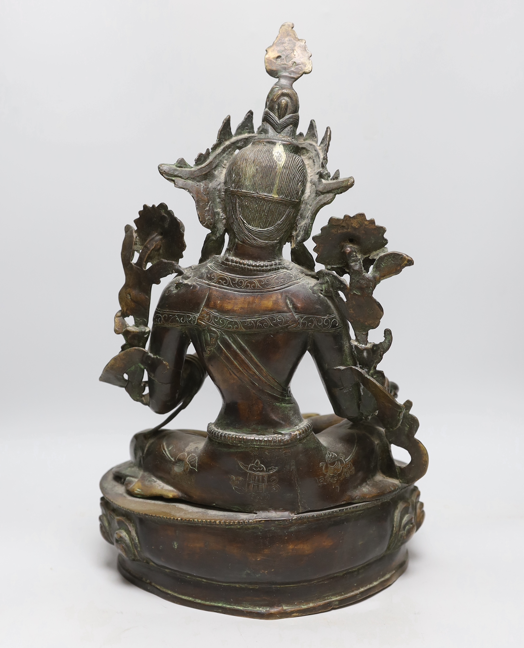 A large Sino-Tibetan bronze of Green Tara, 49cm high